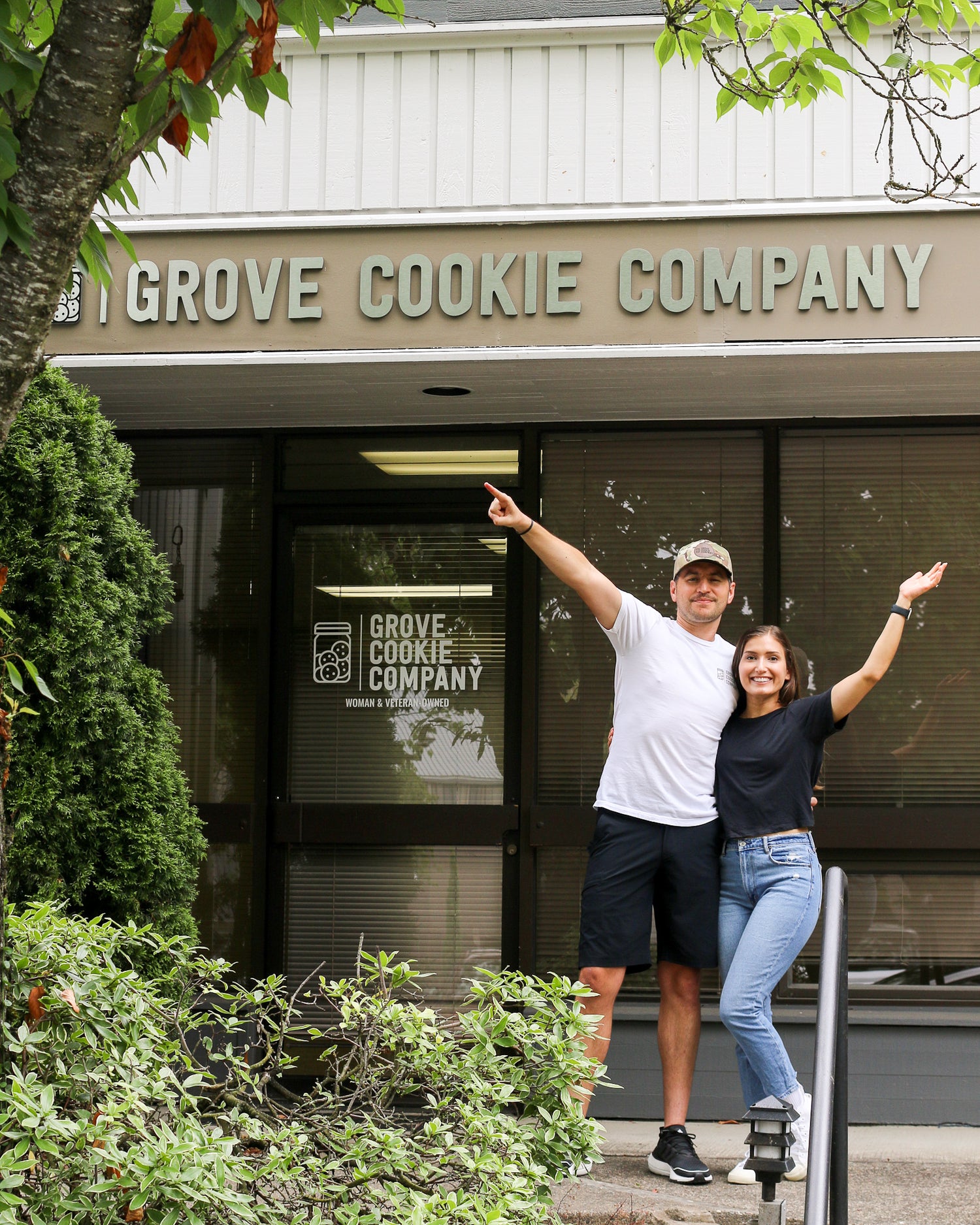 Husband and wife in front of cookie shop